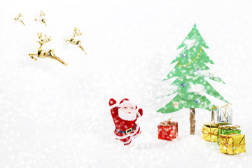 Christmas tree and gift of santa.Used brush tool for white dot.