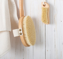 Wooden comb massagersg brushes on wooden planks
