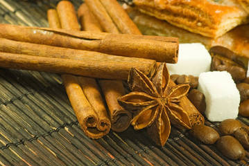 image of cookies, anise stars, sugar, coffee beans closeup