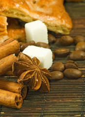 image of cookies, anise stars, sugar, coffee beans closeup