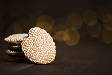 Decorated , Christmas gingerbread on a wooden background