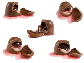 Isolated image of a lot of delicious chocolates with cherries closeup