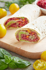 vegetarian rolls stuffed with quinoa, table beet , carrots and o
