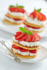 pancakes with whipped cream and strawberries