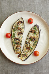 eggplant slices and cherry tomatoes on the plate