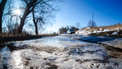 automobile on icy winding country road