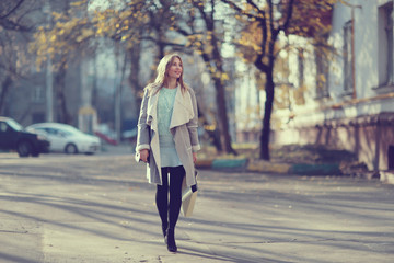 Autumn portrait of happy girl on a walk