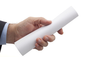 White and blank rolled sheet in the hand of businessman isolated on white background.
