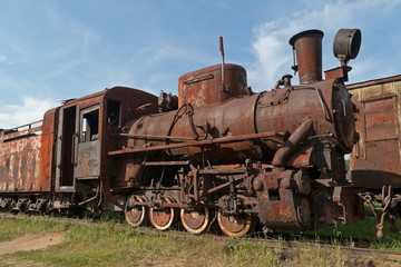 Fototapeta na wymiar Rusty steam locomotive. Talitsy, Yaroslavsky region, Russia. 