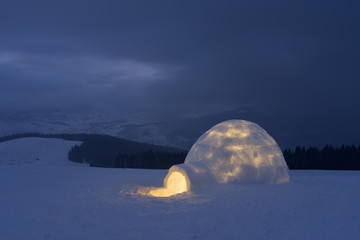 Snow igloo in mountains