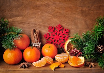 Holidays time. Christmas composition with tangerines, star anise
