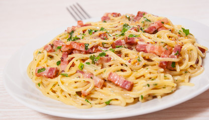 capellini pasta and sauce with bacon