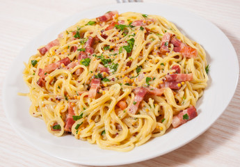capellini pasta and sauce with bacon