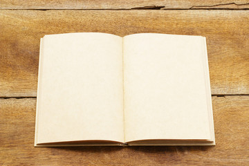Open Notebook page on wooden table
