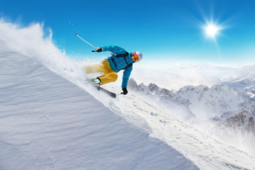 Man skier running downhill