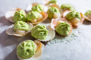 Frozen scallops in shells with garlic butter