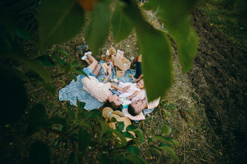 Happy family on lawn in the park