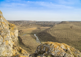 Small river and hills in prairie