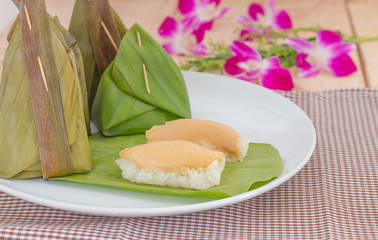 Thailand Sticky rice steamed custard wrapped in banana leaves