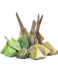 Thailand candy wrapped in banana leaves isolated on white backgr