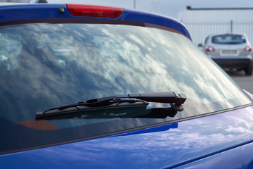 The blue car rear wipers - obrazy, fototapety, plakaty