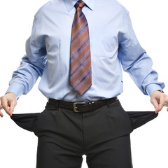 Businessman showing empty pockets