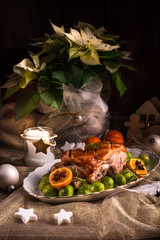 Christmas dinner with brussels sprouts in orange sauce