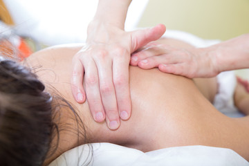 Fototapeta na wymiar shoulder and neck massage closeup