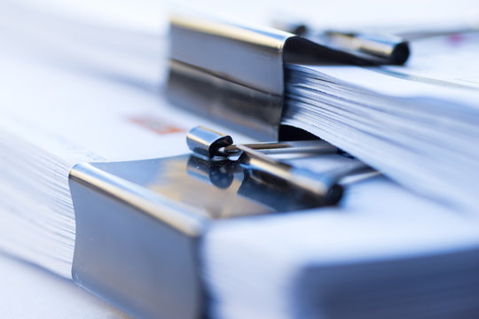 Business image, with stack of paper