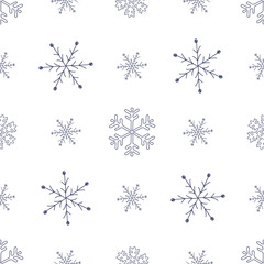 Seamless background of hand drawn snowflakes