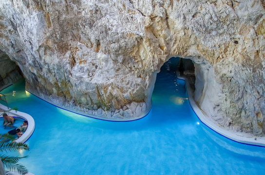 MISKOLC, HUNGARY - NOV 30, 2015: Unidentified people relaxing in a pool in Barlangfurdo, a thermal bath complex inside of a natural cave in Miskolctapolca town. Miskolc city, Hungary