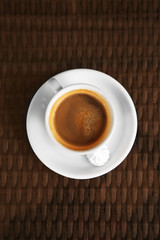 Cup of tasty coffee with zephyr in cafe