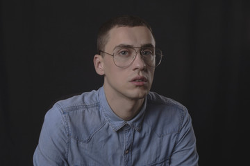 Nerd man posing in studio 