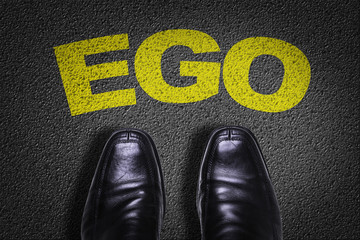 Top View of Business Shoes on the floor with the text: Ego