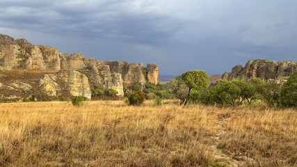 Fototapeta na wymiar Rainstorm is coming on a yellow rocky desert in Madagascar