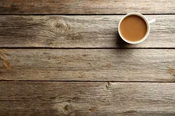 Cup of coffee on a grey wooden table