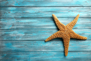 Starfish on a blue wooden table
