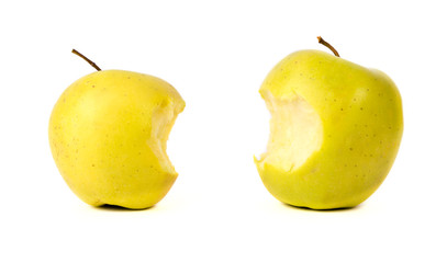 Bitten yellow green apples