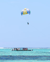 Parasailing over Indian Ocean near Mauritius Island.