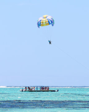Parasailing over Indian Ocean near Mauritius Island.