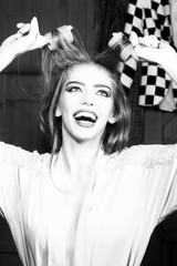 Fototapeta premium Attractive girl with yair-rollers