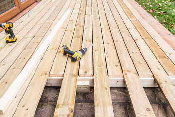Wooden decking, deck, patio construction. © Christine Bird