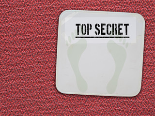 My weight is Top Secret. Bathroom scales, scale, covered over.