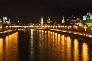 Fototapeta na wymiar illuminated Moskva River in Moscow city