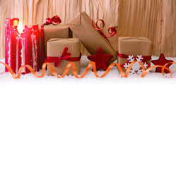 Christmas gifts and red Advent candle.