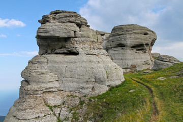 Fototapeta na wymiar The path goes to the two rocks of limestone. Nature Crimea.