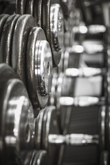 Weights in a Gym.
Gym interior close up, machinery and weightlifting equipment.