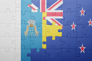 puzzle with the national flag of canary islands and new zealand