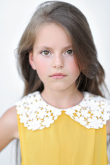 portrait of little girl outdoors in summer © zagorodnaya