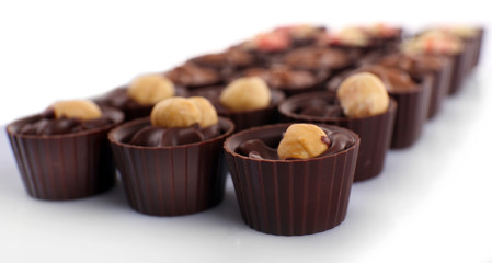 Chocolate sweets isolated on white